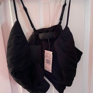 Never been worn black bra top that ties in the front